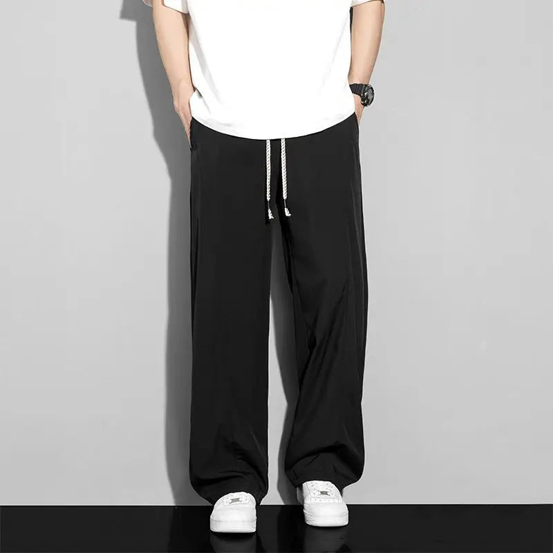 Men's loose-fitting trousers in cool silk