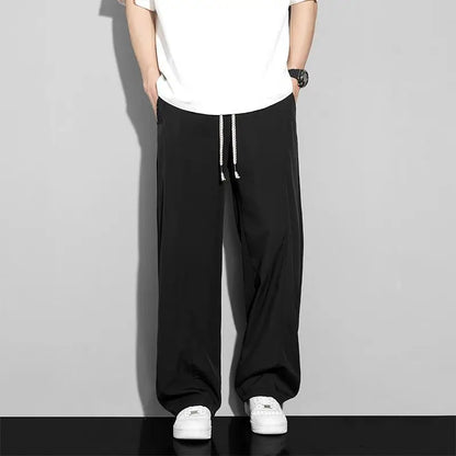 Men's loose-fitting trousers in cool silk
