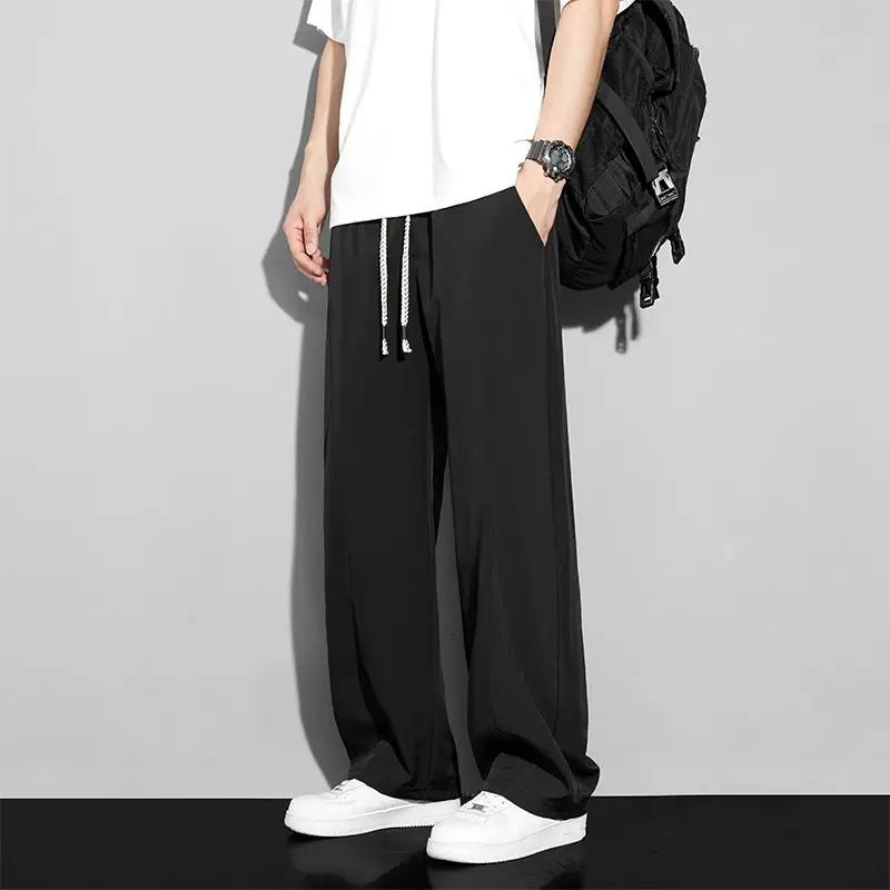 Men's loose-fitting trousers in cool silk