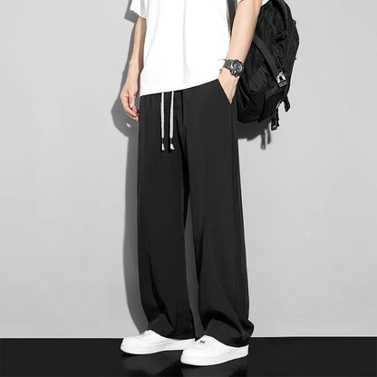 Men's loose-fitting trousers in cool silk